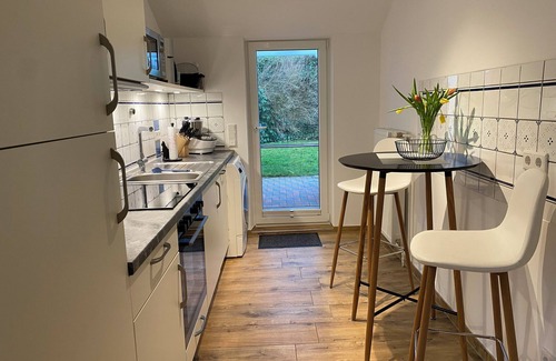 Osterhusum House | Quiet semi-detached house with garden and garage in Husum on the North Sea
