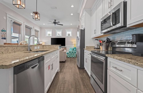 Gulf Shores Cottage | Quiet WHOLE HOUSE btwn the beach and Lagoon with pool, fishing dock, sunsets!