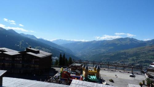 Arc-1800 Apartment | Résidence Tournavelles - Appartement 2 pièces 7 personnes en duplex, au pied des pistes et des commerces, proche de l'ESF et de la garderie dans le villa MAE-1875