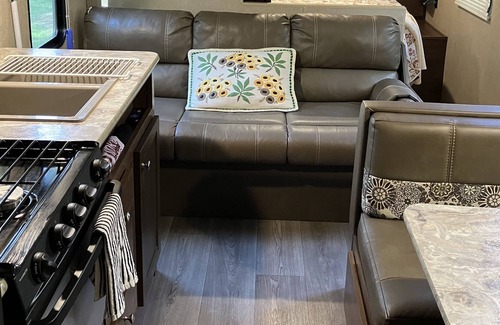 Brevard House | Rader Retreat RV/Camper cozy spot to sit out on the deck after a day of hiking.