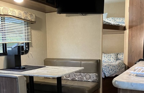 Brevard House | Rader Retreat RV/Camper cozy spot to sit out on the deck after a day of hiking.