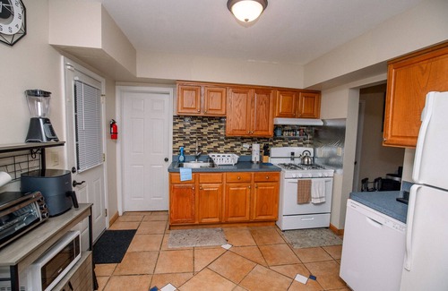 Garfield Heights House | Radiant Rockside Retreat, Fast internet, Self-check in, 3 bdrm, office, garage.