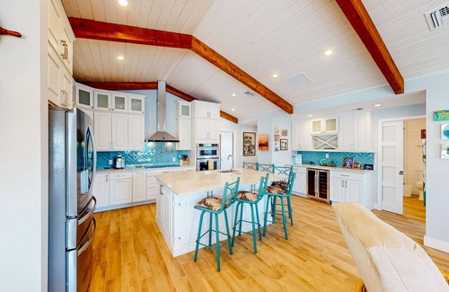 Islamorada House | Radiant waterfront retreat with remarkable views, patio, tennis court, & grill