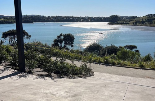 Raglan House | Rangitahi paradise. A modern 4 bedroom home overlooking the estuary in Raglan.