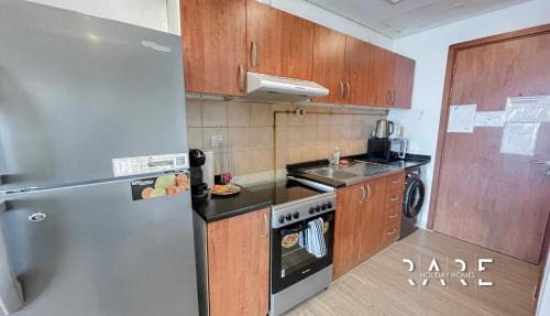 Dubai Production City Apartment | Rare Holiday Homes - Lake View - Near Me'aisem City Centre - The Crescent Tower A - Dubai Production City - R910