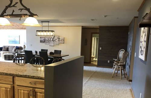 Arkdale Condo | Rare Top Floor Northern Bay Condo Overlooking The Par 3 Green with Lake Views!