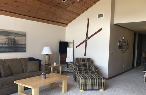 Arkdale Condo | Rare Top Floor Northern Bay Condo Overlooking The Par 3 Green with Lake Views!
