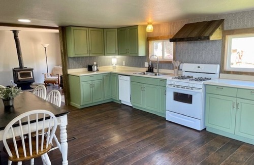 Philipsburg House | Recently remodeled family home with large fenced in back yard, Full size kitchen, 2 full bathrooms, Bedroom 1 has a king size bed, Bedroom 2 has a queen size bed. The flex space has a trundle bed with 2 twins.