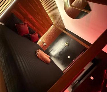 Ogden Apartment | Red Room Jacuzzi Suites