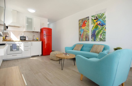 Puerto del Carmen Ski Chalet | Red Volcano - 00 m from the beach-access to the fariones sports centre included (swimming pool, sauna, gym)