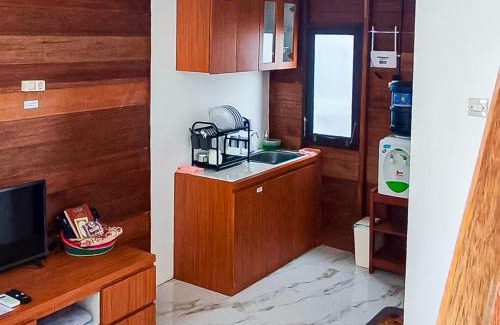 Kalimantan Hotel | RedDoorz at Raujan Guesthouse Syariah Banjarmasin