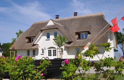 Lobbe Villa | Reethus am Strand - Haushälfte 1 mit Kamin, Sauna