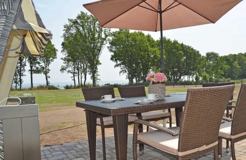 Lobbe Villa | Reethus am Strand - Haushälfte 2 mit Kamin, Sauna