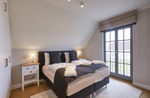 Kreptitz House | Reetland am Meer - Luxus Reetdachvilla mit 3 Schlafzimmern, Sauna und Kamin E17