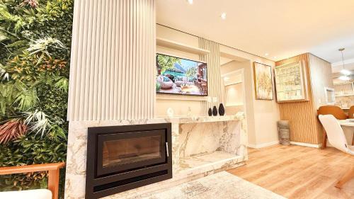 Vila Luiza Apartment | Refúgio Moderno com Lareira em Canela