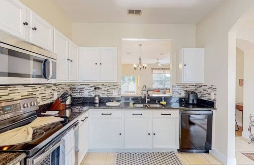 Wellington House | Regal Palms Townhome: Sunshine, Pool, & Golf Fun