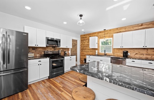 Bentonville House | Relax and Unwind at River Front Oasis w/Hot Tub