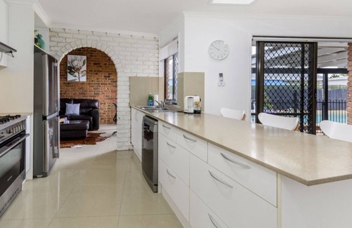 Banksia Beach House | Relax at the Poolside Escape