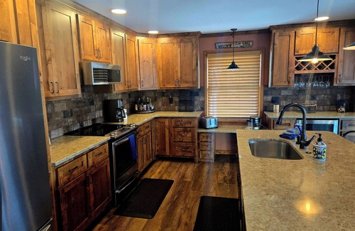 Sunrise Beach House | Relax by Lake of the Ozarks in your spacious Sunrise Beach retreat on 1 acre.