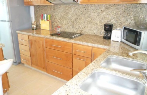Colina del Sol Condo | Relax in our Condo With Spectacular Ocean, City and Mountain View.