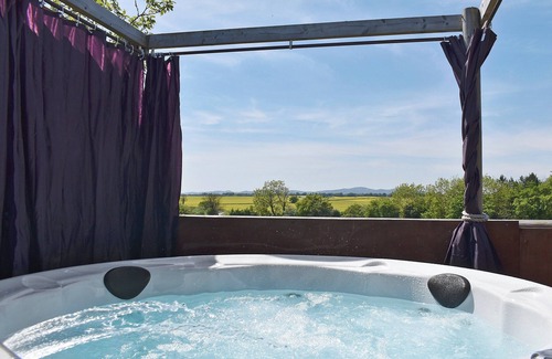 Stoulton Cottage | Relax in the hot tub whilst admiring beautiful views over the surrounding countryside.