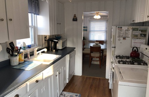 North Beach Haven House | Relax on the deck of this 2nd floor oceanside duplex just steps from the beach.