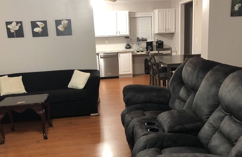 Maryville House | Relax while listening to a Natural Waterfall from your Private Park!