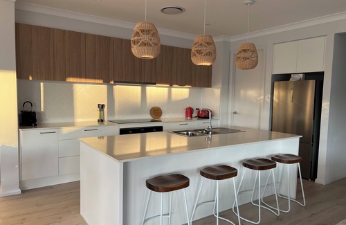 Manyana House | Relaxing coastal getaway w fire pit. A short stroll to the beach and surf.