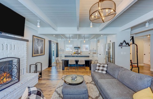 Tahoe Island House | Relaxing dog-friendly home with fireplace, hot tub, patio, game room, & W/D