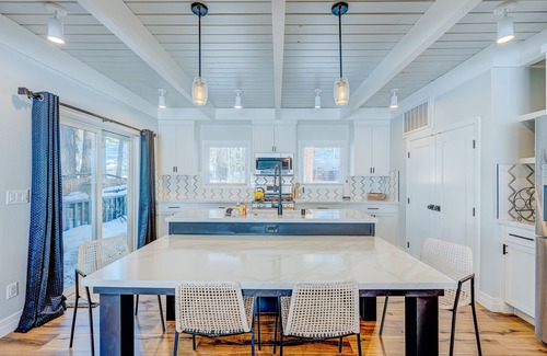 Tahoe Island House | Relaxing dog-friendly home with fireplace, hot tub, patio, game room, & W/D