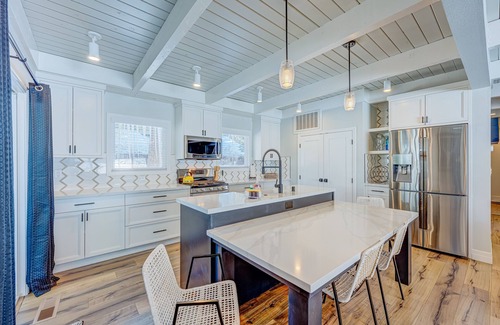 Tahoe Island House | Relaxing dog-friendly home with fireplace, hot tub, patio, game room, & W/D