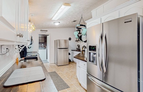 Beulah House | Relaxing lakefront retreat with kayaks, wraparound deck & firepit - dog-friendly
