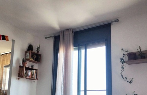 Sant Carles de la Rapita Apartment | Relaxing stay with panoramic Delta and harbour views.