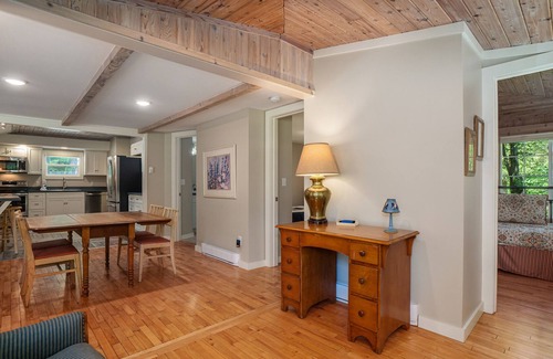 Frankfort Cottage | Remodeled cottage with a modern kitchen, fireplace, kayaks, & paddle boards