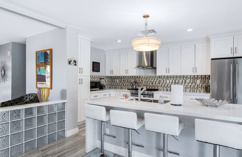 Racquet Club South House | Remodeled Gem with Pool, Hot Tub, Fire Pit, Grill & Putting Green