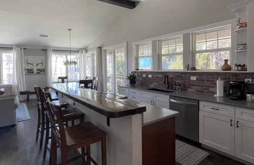 Neptune Beach House | Remodeled home just steps to the beach (Pet-Friendly)