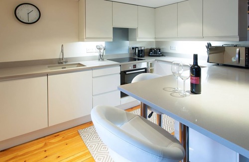 Belford Cottage | Renovated cart shed with enclosed gardens and views towards Holy Island.