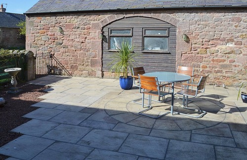Belford Cottage | Renovated cart shed with enclosed gardens and views towards Holy Island.
