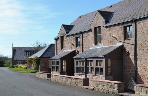 Belford Cottage | Renovated cart shed with enclosed gardens and views towards Holy Island.