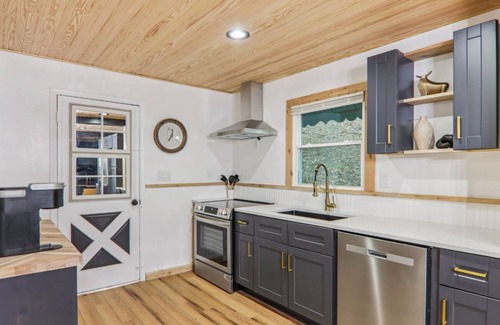 Burnsville Ski Chalet | Renovated chalet just a walk down the hill to downtown Burnsville! Pet Friendly