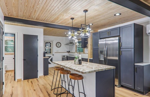 Burnsville Ski Chalet | Renovated chalet just a walk down the hill to downtown Burnsville! Pet Friendly