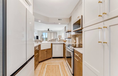 Seawinds Condo Condo | Renovated direct oceanfront corner condo with a large balcony, heated pool, and garage