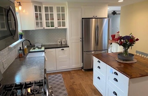 Kennebunk House | Renovated farmhouse featuring two connected rental units with an interior access door. Large Yard