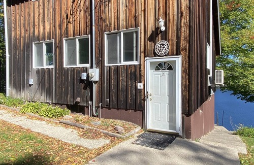 Farwell Cabin | Renovated lake cabin w/raised deck & screened in porch, close to town & skiing!