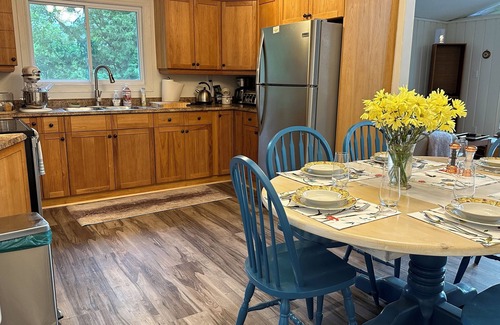 Georgian Bay Cottage | Renovated water front cottage w/firepit, multi level decks & screened in porch.