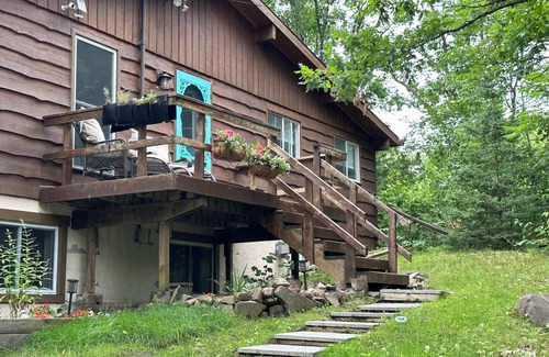 Georgian Bay Cottage | Renovated water front cottage w/firepit, multi level decks & screened in porch.