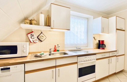 Kirchdorf Apartment | Rental-Deluxe-Private Bathroom-Garden view-Garten-1Schlafzimmer-DG