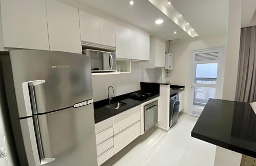 Gonzaga Apartment | Requinte, vista mar, sauna e piscina!
