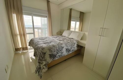 Gonzaga Apartment | Requinte, vista mar, sauna e piscina!