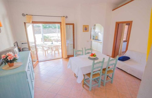 Baia Sant'Anna Apartment | Residence Baia Sant'Anna with swimming pool and two bathrooms BudoniRentals